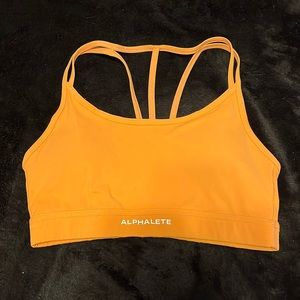 Orange Alphalete sports bra